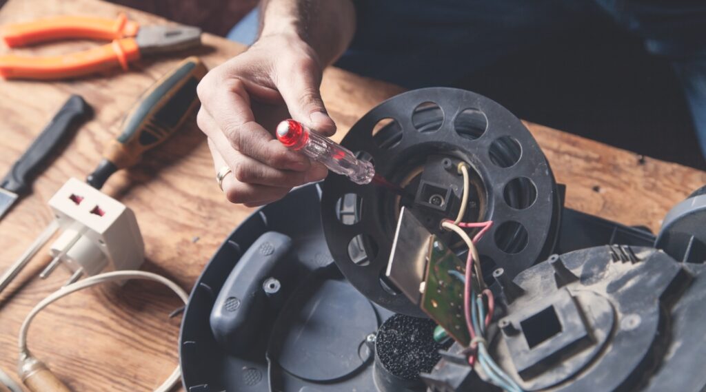 Chính sách bảo hành cho dịch vụ sửa máy hút bụi Midea tại Sửa Điện Tử